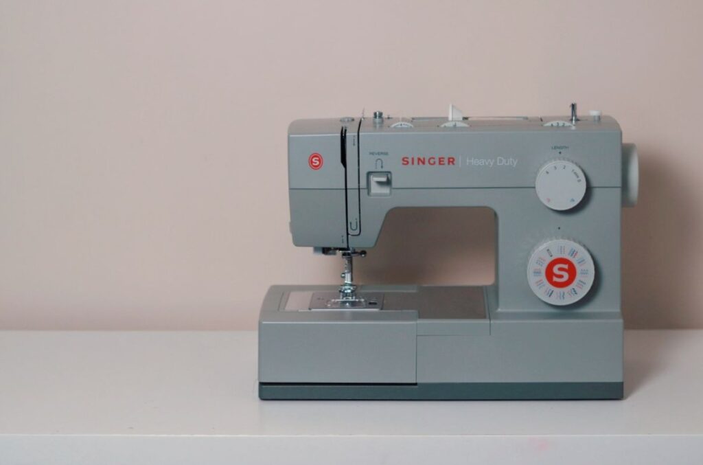 sewing machine sitting on white counter