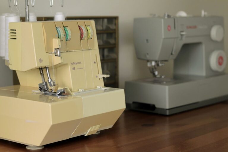 serger and sewing machine on table