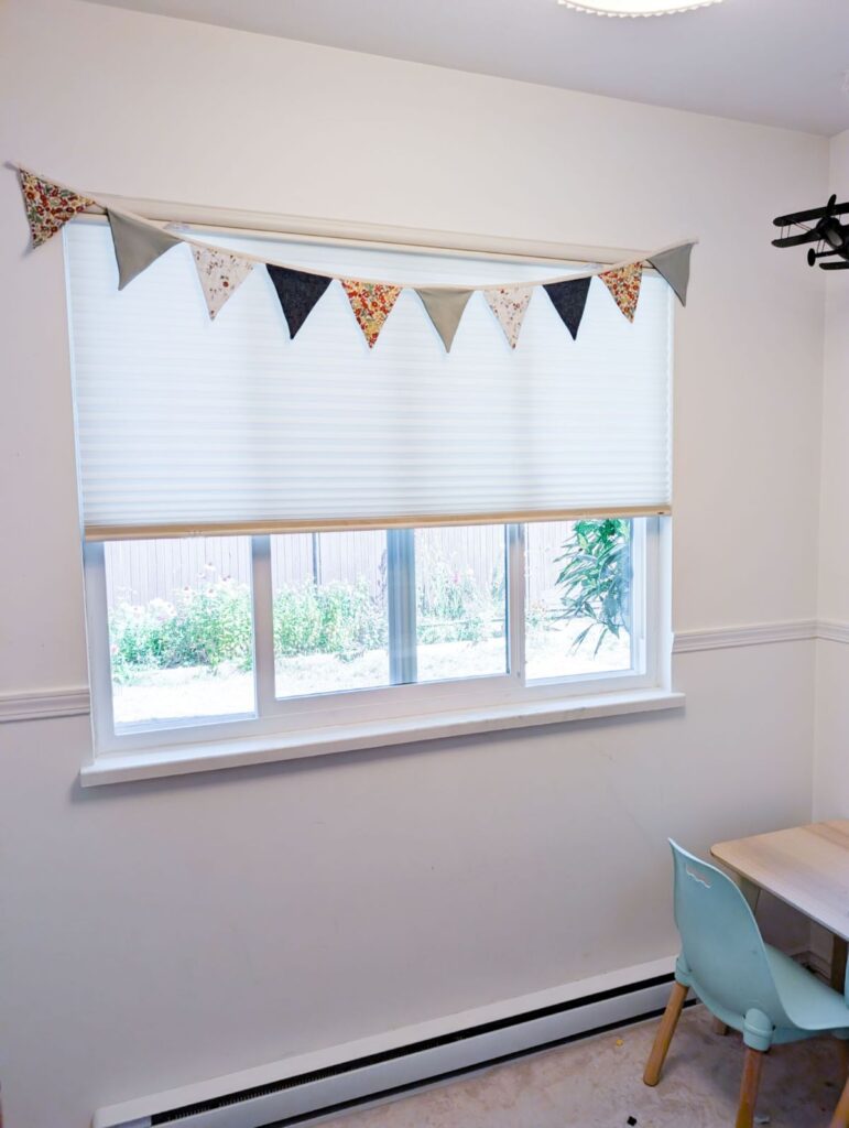 diy reversible bunting garland hanging over window